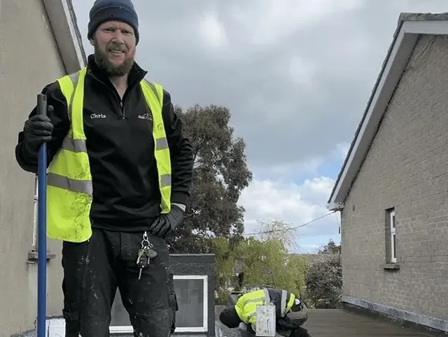 Chris O'Brien and the Roof Pro Ltd team carrying out flat roof work