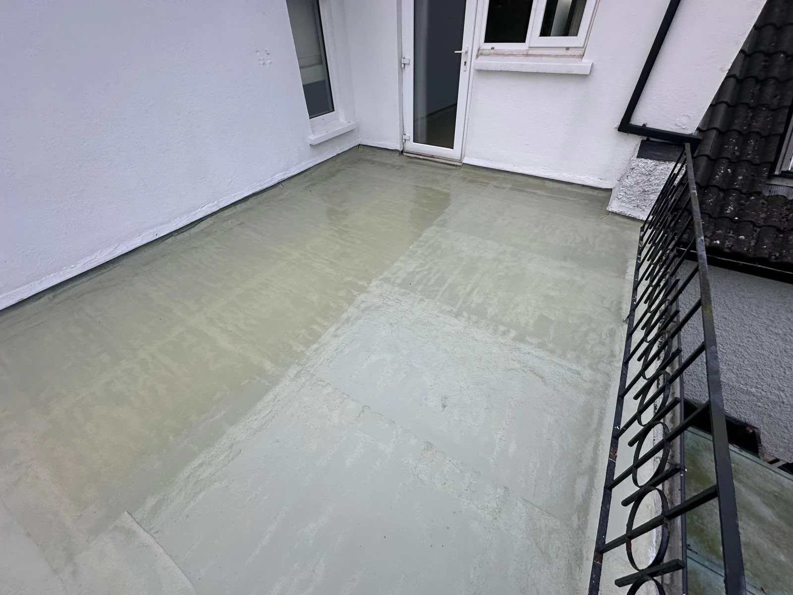 Balcony waterproofing base coat applied in Dublin by Roof Pro Ltd
